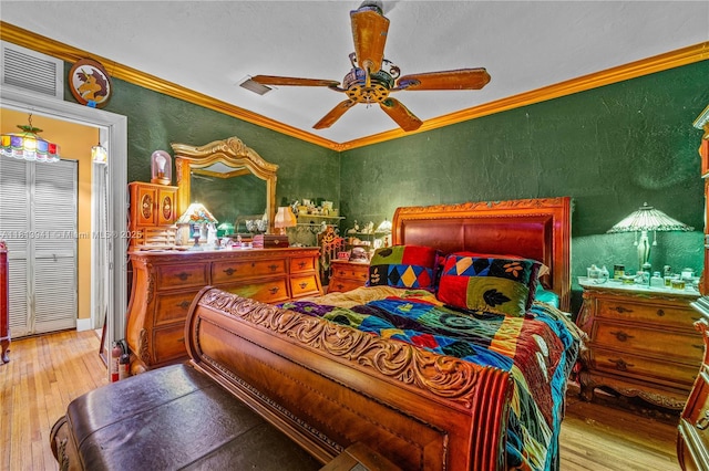461 Morningside Dr, Miami Springs, FL 33166 - bedroom featuring hardwood / wood-style flooring, crown molding, a textured wall, and a ceiling fan