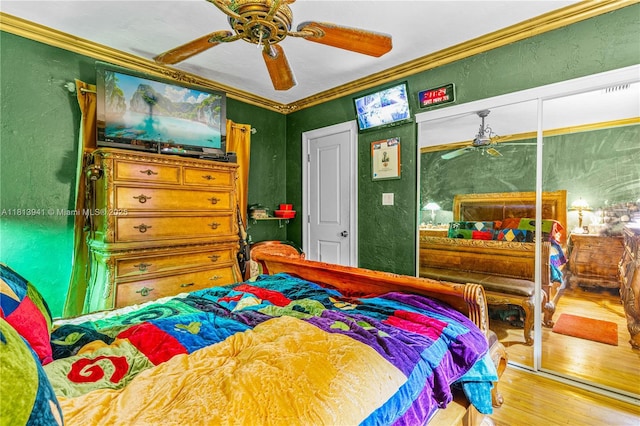 461 Morningside Dr, Miami Springs, FL 33166 - bedroom with hardwood / wood-style flooring, a textured wall, ceiling fan, and ornamental molding