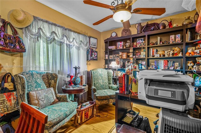 461 Morningside Dr, Miami Springs, FL 33166 - sitting room featuring a ceiling fan and wood finished floors