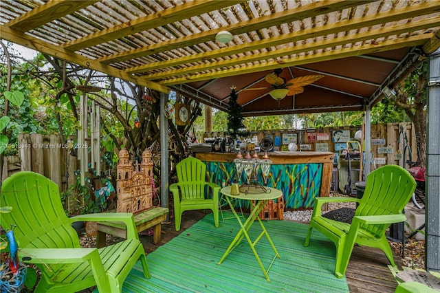 461 Morningside Dr, Miami Springs, FL 33166 - wooden terrace featuring a fenced backyard, a ceiling fan, and a gazebo