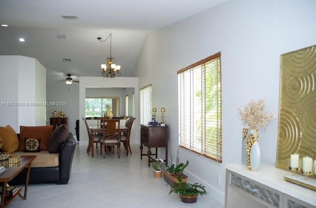 1353 Majesty Ter, Weston, FL 33327 - living area featuring a ceiling fan, a chandelier, light tile patterned floors, vaulted ceiling, and recessed lighting