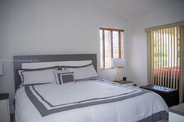 1353 Majesty Ter, Weston, FL 33327 - bedroom with lofted ceiling