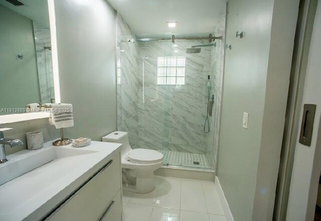 1353 Majesty Ter, Weston, FL 33327 - full bathroom with a marble finish shower, tile patterned flooring, and vanity