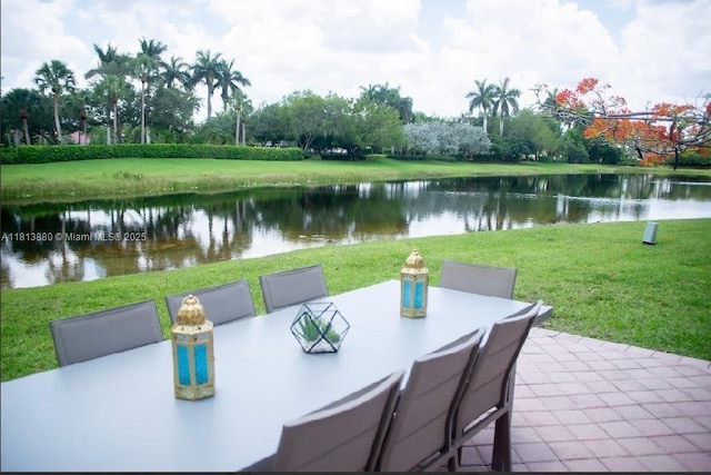 1353 Majesty Ter, Weston, FL 33327 - view of patio / terrace with a water view and outdoor dining space