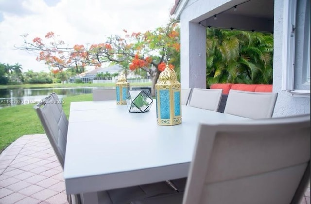 1353 Majesty Ter, Weston, FL 33327 - view of patio featuring a water view, outdoor dining space, and outdoor lounge area