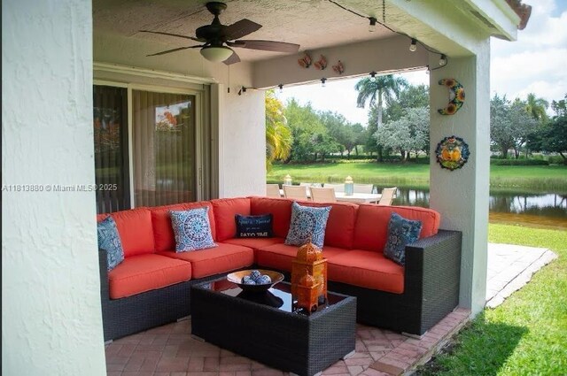 1353 Majesty Ter, Weston, FL 33327 - view of patio / terrace featuring a ceiling fan, a water view, and an outdoor hangout area