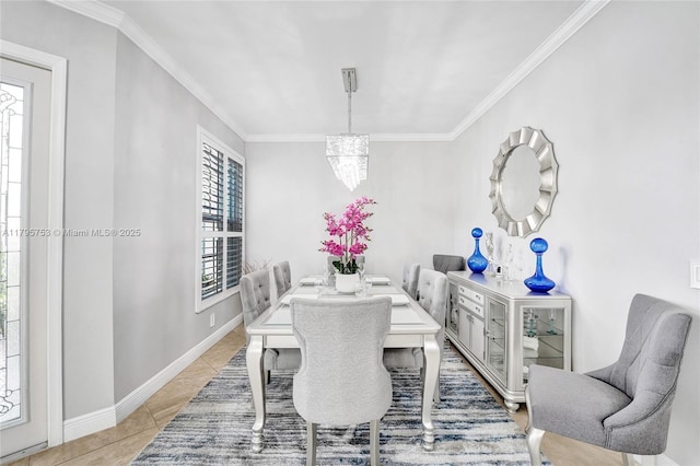 16331 SW 23rd St, Miramar, FL 33027 - dining room with crown molding, tile patterned floors, a chandelier, and baseboards