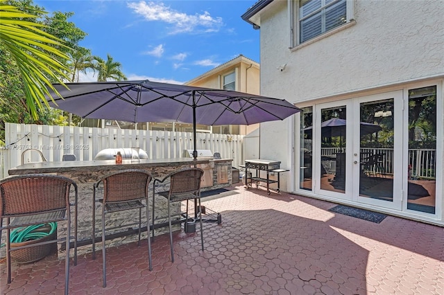16331 SW 23rd St, Miramar, FL 33027 - view of patio / terrace with an outdoor kitchen and an outdoor bar