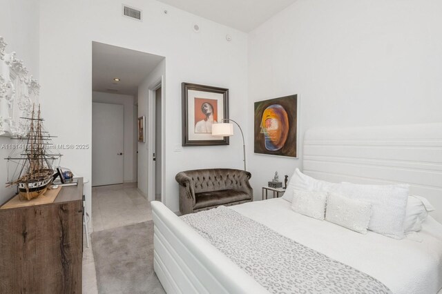 900 Brickell Key Blvd Unit 1702, Miami, FL 33131 - bedroom with light colored carpet and baseboards