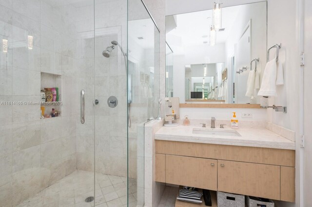 900 Brickell Key Blvd Unit 1702, Miami, FL 33131 - bathroom featuring vanity and a shower stall