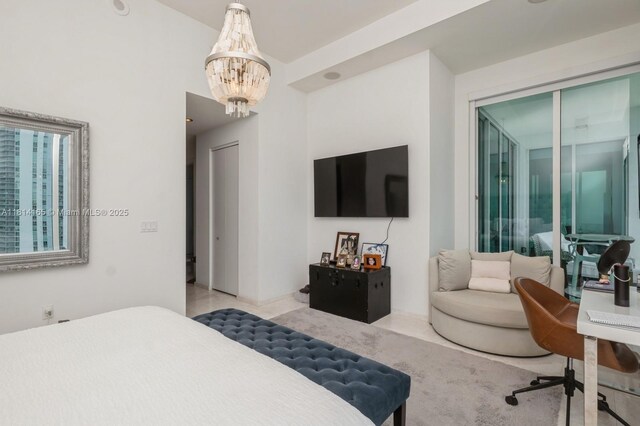 900 Brickell Key Blvd Unit 1702, Miami, FL 33131 - bedroom featuring a chandelier