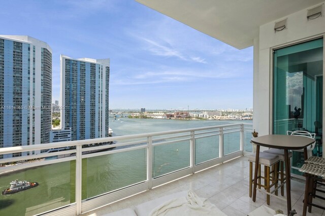 900 Brickell Key Blvd Unit 1702, Miami, FL 33131 - balcony featuring a water view and a city view