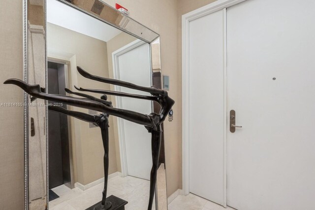900 Brickell Key Blvd Unit 1702, Miami, FL 33131 - exercise room featuring baseboards
