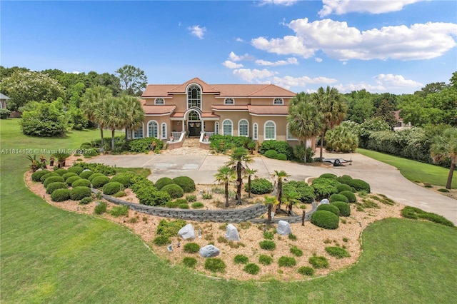 200 Asphodel Dr, Al, ,, AL 36303 - mediterranean / spanish-style home with stucco siding and a front lawn
