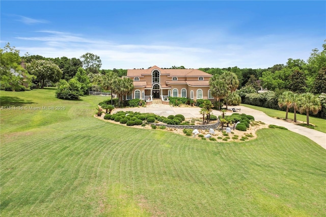200 Asphodel Dr, Al, ,, AL 36303 - mediterranean / spanish home featuring a front yard and stucco siding