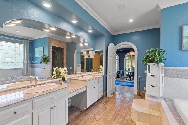 200 Asphodel Dr, Al, ,, AL 36303 - full bathroom featuring crown molding, vanity, a bath, healthy amount of natural light, and wood finished floors