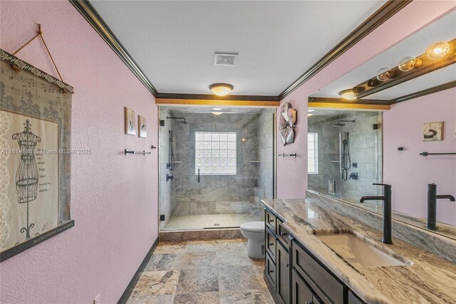 200 Asphodel Dr, Al, ,, AL 36303 - full bath with ornamental molding, a shower stall, a textured wall, vanity, and stone finish flooring