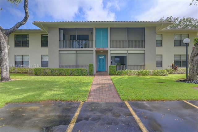 9965 Pineapple Tree Dr Unit 203, Boynton Beach, FL 33436 - view of property with uncovered parking