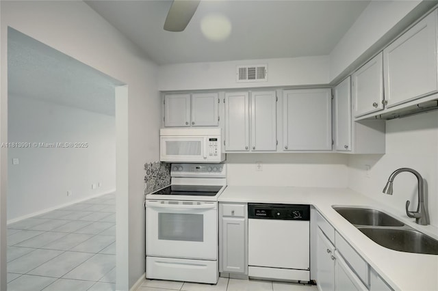 9965 Pineapple Tree Dr Unit 203, Boynton Beach, FL 33436 - kitchen with white appliances, light countertops, a ceiling fan, and light tile patterned floors