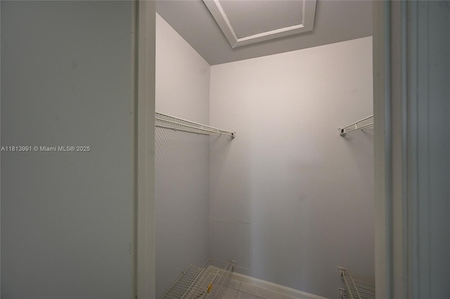 9965 Pineapple Tree Dr Unit 203, Boynton Beach, FL 33436 - spacious closet with tile patterned flooring