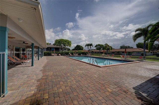 9965 Pineapple Tree Dr Unit 203, Boynton Beach, FL 33436 - community pool with a patio area and a ceiling fan