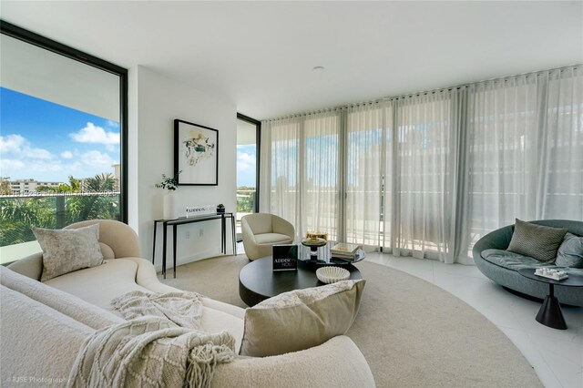9901 W Bay Harbor Dr Unit 601, Bay Harbor Islands, FL 33154 - tiled living area with floor to ceiling windows