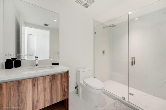 9901 W Bay Harbor Dr Unit 601, Bay Harbor Islands, FL 33154 - full bathroom with a marble finish shower, vanity, and toilet