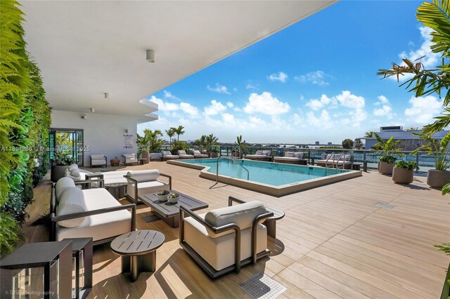 9901 W Bay Harbor Dr Unit 601, Bay Harbor Islands, FL 33154 - community pool with an outdoor living space
