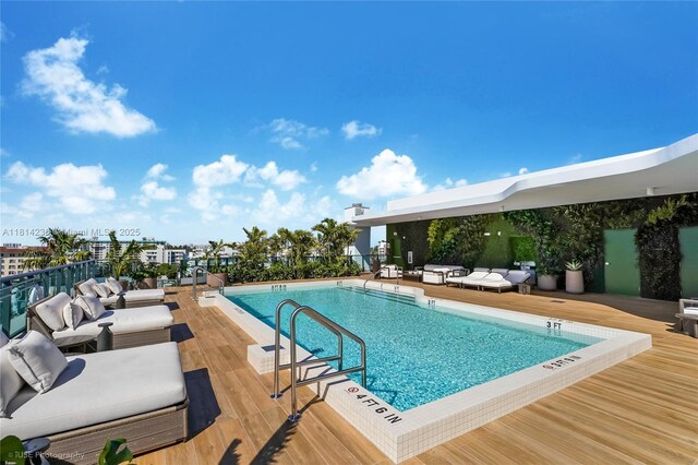 9901 W Bay Harbor Dr Unit 601, Bay Harbor Islands, FL 33154 - community pool featuring an outdoor living space and a deck