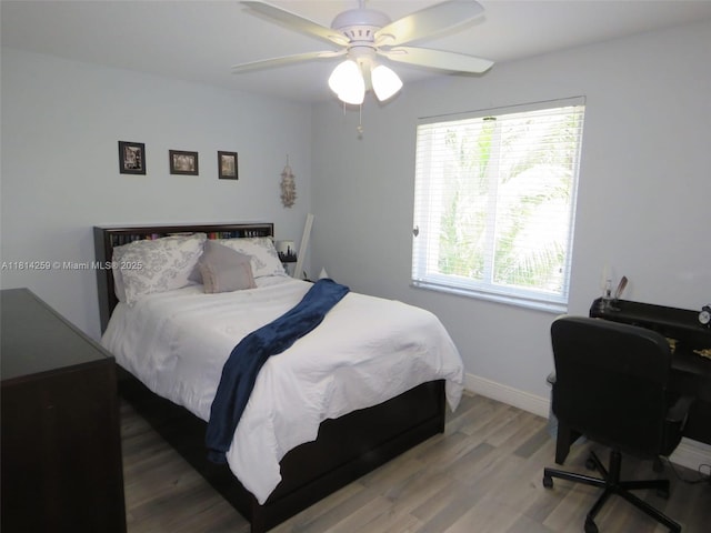 16815 SW 49th Ct, Miramar, FL 33027 - bedroom with wood finished floors, baseboards, a ceiling fan, and a desk