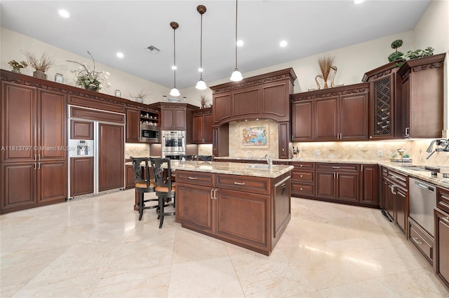 1437 SE 13th St, Deerfield Beach, FL 33441 - kitchen featuring a sink, tasteful backsplash, a center island, and recessed lighting