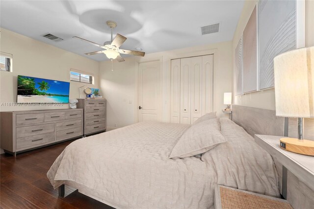 1437 SE 13th St, Deerfield Beach, FL 33441 - bedroom with dark wood-style floors and a ceiling fan