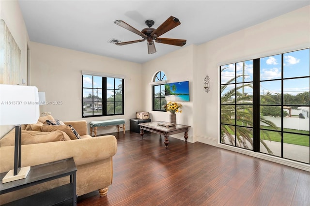 1437 SE 13th St, Deerfield Beach, FL 33441 - living room featuring a ceiling fan, dark wood-style floors, and baseboards
