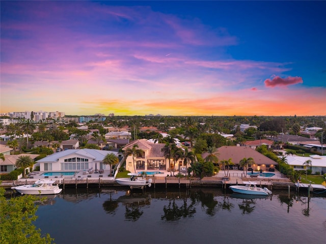 1437 SE 13th St, Deerfield Beach, FL 33441 - aerial view at dusk of a residential view and a water view