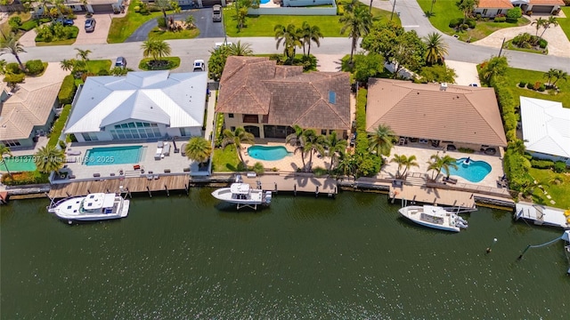 1437 SE 13th St, Deerfield Beach, FL 33441 - aerial perspective of suburban area featuring a pool area and a nearby body of water