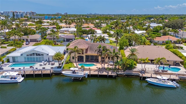 1437 SE 13th St, Deerfield Beach, FL 33441 - aerial perspective of suburban area featuring a pool area and a large body of water