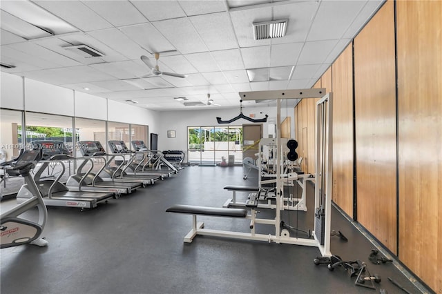 20379 W Country Club Dr Unit 1237, Aventura, FL 33180 - exercise room featuring plenty of natural light, a ceiling fan, and a drop ceiling