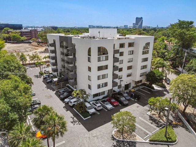2715 Tigertail Ave Unit 102, Miami, FL 33133 - view of property featuring a view of city and uncovered parking