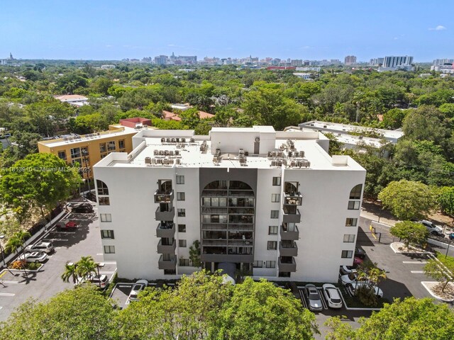 2715 Tigertail Ave Unit 102, Miami, FL 33133 - drone / aerial view of skyline and a tree filled landscape