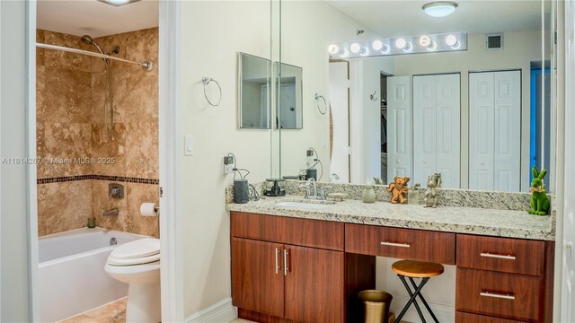 20355 NE 34th Ct Unit 325, Aventura, FL 33180 - bathroom featuring vanity, shower / washtub combination, toilet, and a closet