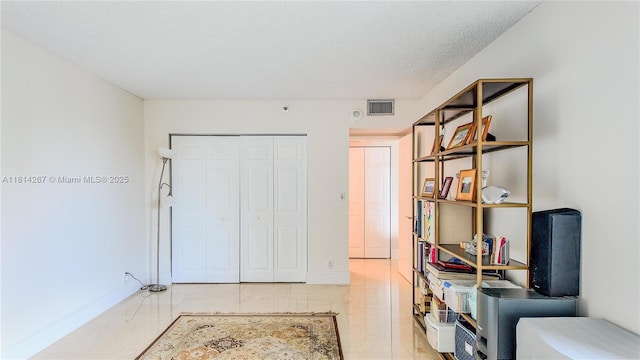 20355 NE 34th Ct Unit 325, Aventura, FL 33180 - bedroom with a closet and baseboards