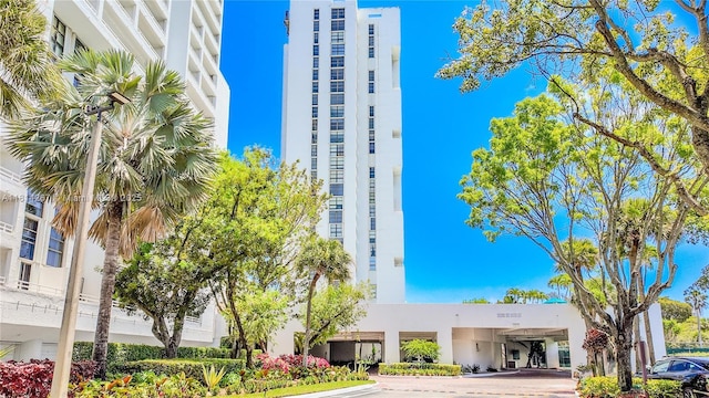 20355 NE 34th Ct Unit 325, Aventura, FL 33180 - view of building exterior with a carport