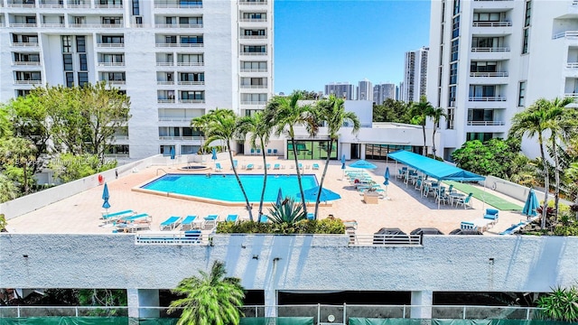 20355 NE 34th Ct Unit 325, Aventura, FL 33180 - community pool featuring a patio area