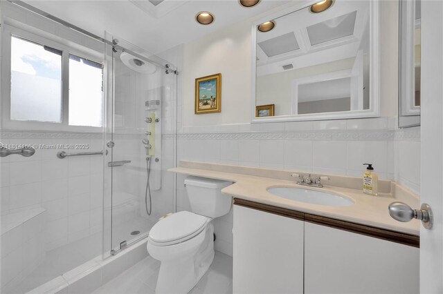 2825 Granada Blvd Unit 3B, Coral Gables, FL 33134 - full bathroom featuring a shower stall, vanity, tile walls, and recessed lighting