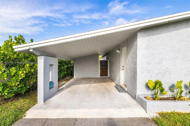 2111 NE 14th Ct, Hollywood, FL 33020 - view of parking / parking lot with a carport