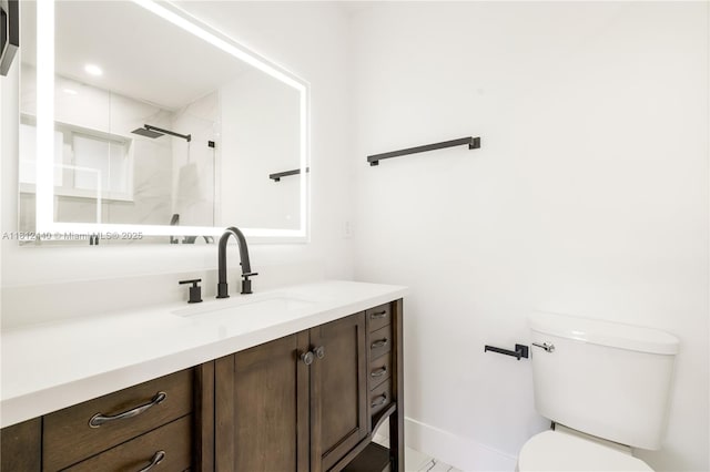 2111 NE 14th Ct, Hollywood, FL 33020 - full bath featuring vanity, toilet, a shower, and baseboards