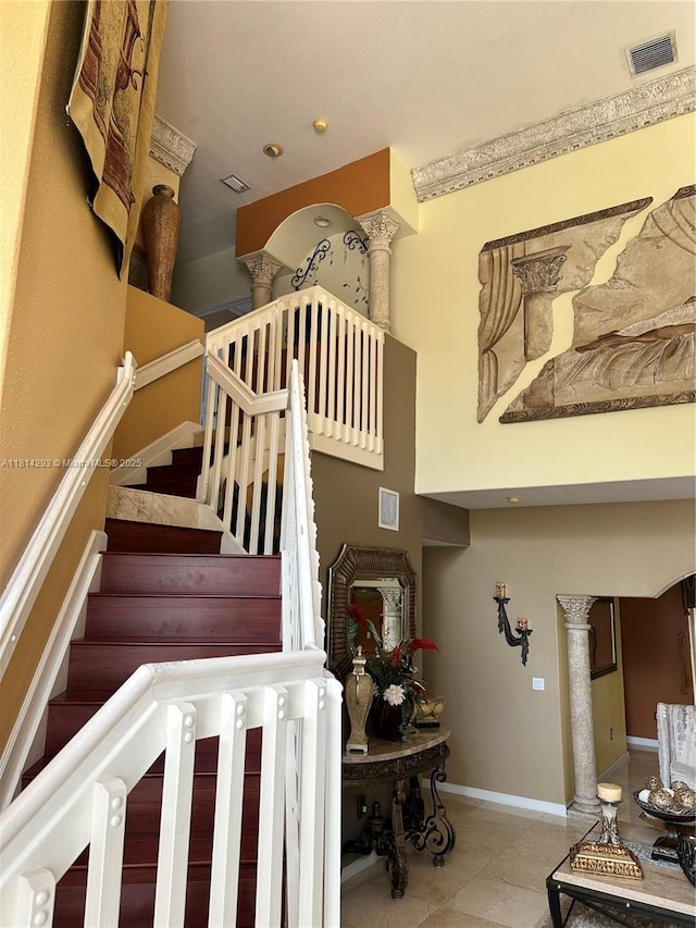 5320 SW 130th Ter, Miramar, FL 33027 - staircase with ornate columns and tile patterned floors