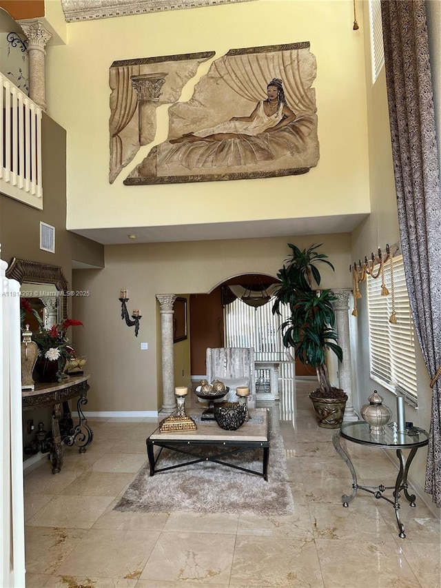 5320 SW 130th Ter, Miramar, FL 33027 - living area featuring a towering ceiling and ornate columns