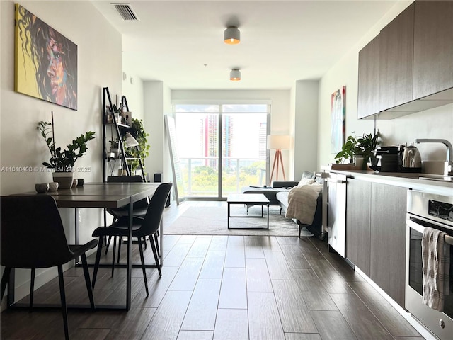 1600 SW 1st Ave Unit 813, Miami, FL 33129 - living area featuring dark wood finished floors