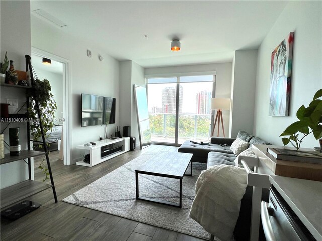 1600 SW 1st Ave Unit 813, Miami, FL 33129 - living area with dark wood finished floors